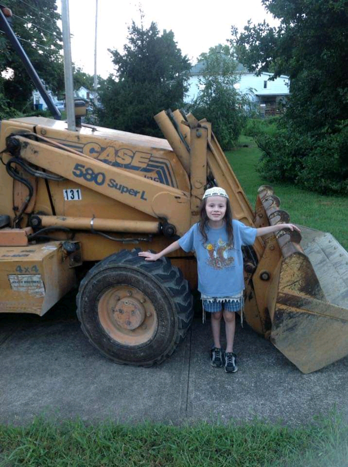 Nanach Clothing Merch Nanach Kid In Beanie In Front Of Bulldozer